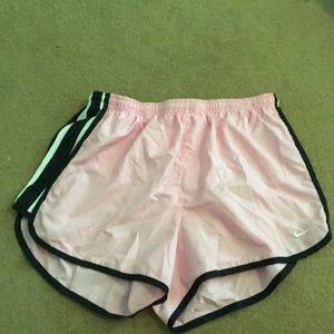 Light pink Nike running shorts